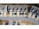 Aerial view of townhomes showing ample parking and appealing community layout at 4355 Pond Pine Trl, Morrisville, NC 27560