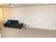 Finished basement has seating area with projector at 4355 Pond Pine Trl, Morrisville, NC 27560