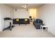 Spacious finished basement with comfortable seating area and workstation at 4355 Pond Pine Trl, Morrisville, NC 27560