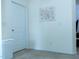 Bedroom with light carpet, white walls, and a white door at 4355 Pond Pine Trl, Morrisville, NC 27560