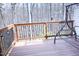 Spacious wooden deck features metal railings and provides a relaxing outdoor space at 4355 Pond Pine Trl, Morrisville, NC 27560