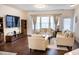 Comfortable living room with stylish furniture, a large TV, and ample space for relaxation at 4355 Pond Pine Trl, Morrisville, NC 27560