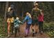 Gathering walking on a tree lined trail in a wooded area at 4450 Poppy Mallow Ln, Oxford, NC 27565