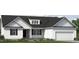 Well-lit, single-story home with white siding, black shutters and a manicured lawn with small flowering plants at 4451 Poppy Mallow Ln, Oxford, NC 27565