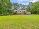 Beautiful view of this homes spacious backyard with mature tree border at 4508 Old Us 421 N N, Siler City, NC 27344