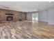 This finished basement has wood-look floors, a fireplace, and french doors at 4508 Old Us 421 N N, Siler City, NC 27344