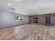 This finished basement features wood-look flooring, a fireplace, and natural light at 4508 Old Us 421 N N, Siler City, NC 27344