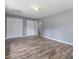 Empty bedroom with hardwood floors, neutral walls, closet and window at 4508 Old Us 421 N N, Siler City, NC 27344