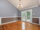 Charming dining area featuring hardwood floors and access to outdoor deck at 4508 Old Us 421 N N, Siler City, NC 27344