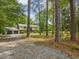 Charming two-story home with an attached two-car garage and a long driveway at 4508 Old Us 421 N N, Siler City, NC 27344