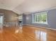 Spacious living room with hardwood floors and large window showcasing natural light at 4508 Old Us 421 N N, Siler City, NC 27344