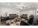 Cozy living space with recliners, wood floors, and a patterned rug for a relaxing atmosphere at 4907 Sleepy Falls Run, Knightdale, NC 27545
