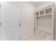 Inviting mudroom with built-in storage, bench, and convenient access to the front door at 4907 Sleepy Falls Run, Knightdale, NC 27545