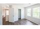 Bright bedroom with hardwood floors, a double closet, and neutral paint at 5505 Pennfine Dr, Raleigh, NC 27610