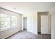 Sunlit bedroom with ample closet space and new vinyl plank flooring at 5505 Pennfine Dr, Raleigh, NC 27610