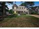 Charming two-story home with a well-manicured lawn and inviting front porch at 5505 Pennfine Dr, Raleigh, NC 27610