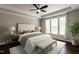Spacious bedroom features a tray ceiling, large windows, and a sitting bench at 5638 Wade Park Blvd, Raleigh, NC 27607