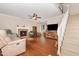 Spacious living room features a fireplace and staircase, offering a cozy yet open atmosphere at 6225 Waterside Ln, Raleigh, NC 27613