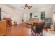 Inviting living room with hardwood floors, a ceiling fan, and natural light, perfect for relaxing or entertaining at 6225 Waterside Ln, Raleigh, NC 27613