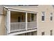 Overhead view of the back porch, showing the white railing and french doors at 7404 Halifax Rd, Youngsville, NC 27596