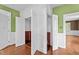 Bedroom with hardwood floors and large closets offering ample storage space at 7404 Halifax Rd, Youngsville, NC 27596
