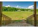 Spacious backyard with lush greenery from the porch's viewpoint at 80 Shambley Meadows Dr, Pittsboro, NC 27312