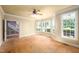 Spacious bonus room with ample natural light from large windows, ready for personalization and customization at 80 Shambley Meadows Dr, Pittsboro, NC 27312