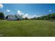 Charming home featuring a spacious yard with a well-maintained lawn at 80 Shambley Meadows Dr, Pittsboro, NC 27312
