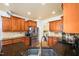 Well-appointed kitchen featuring stainless steel appliances, granite countertops, and custom cabinetry, perfect for cooking at 80 Shambley Meadows Dr, Pittsboro, NC 27312