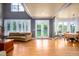 Spacious living room filled with natural light showcasing beautiful floors and French doors at 80 Shambley Meadows Dr, Pittsboro, NC 27312