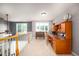 Well-lit loft area with desk, built-in storage, and access to natural light at 80 Shambley Meadows Dr, Pittsboro, NC 27312