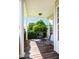 Relax on this covered porch with lovely views of the yard at 80 Shambley Meadows Dr, Pittsboro, NC 27312