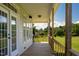 View of porch with access to yard and natural light from windows at 80 Shambley Meadows Dr, Pittsboro, NC 27312