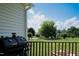 Enjoy outdoor cooking on this backyard porch with a grill at 80 Shambley Meadows Dr, Pittsboro, NC 27312