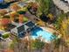 Overhead view of a community pool and playground near a clubhouse at 821 Stackhurst Way, Wake Forest, NC 27587