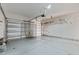Spacious two-car garage with overhead storage and automatic door at 821 Stackhurst Way, Wake Forest, NC 27587