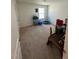 Bright bedroom with a window, neutral carpet and ample space for storage or play at 99 Still Hand Dr, Clayton, NC 27527