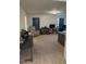 Spacious room with plush carpeting, neutral decor, and furniture for comfortable living at 99 Still Hand Dr, Clayton, NC 27527