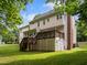 Spacious backyard featuring a well-maintained deck, perfect for outdoor entertaining and leisure at 100 Silver Lining Ln, Cary, NC 27513