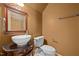 Half bathroom featuring stylish vanity with white vessel sink and modern fixtures at 100 Silver Lining Ln, Cary, NC 27513
