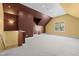 Upstairs bonus room features varied wall colors and a comfortable carpeted floor at 100 Silver Lining Ln, Cary, NC 27513