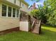 Wood deck overlooking green, landscaped yard with mature shade trees at 100 Silver Lining Ln, Cary, NC 27513