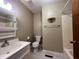 Functional bathroom with updated fixtures and storage space, maximizing comfort at 1012 Bermuda Run, Knightdale, NC 27545