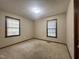This bedroom features neutral walls and two windows at 1012 Bermuda Run, Knightdale, NC 27545