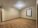 This bedroom features neutral walls and wood flooring at 1012 Bermuda Run, Knightdale, NC 27545