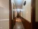 Long hallway with wood trim detail leading to bedrooms and living spaces at 1012 Bermuda Run, Knightdale, NC 27545