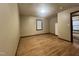 This living room features neutral walls and wood flooring at 1012 Bermuda Run, Knightdale, NC 27545