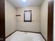 This room features neutral walls and tiled flooring at 1012 Bermuda Run, Knightdale, NC 27545