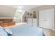 Spacious bedroom featuring large windows and versatile living space at 104 Edgewater Cir, Chapel Hill, NC 27516