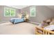 Comfortable bedroom featuring neutral walls and hardwood floors at 104 Edgewater Cir, Chapel Hill, NC 27516